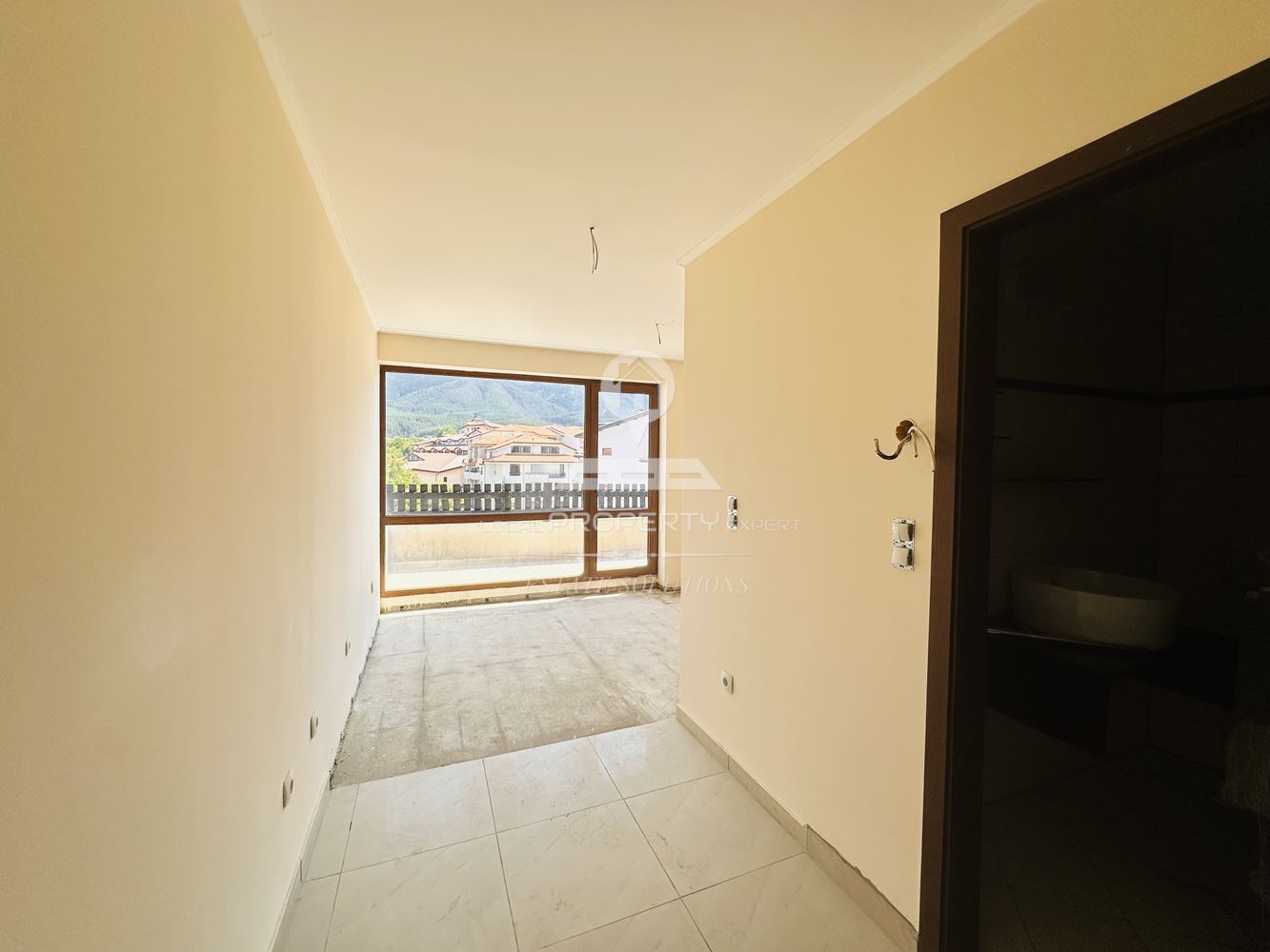 СТУДИО С ПАНОРАМНА ГЛЕДКА В ЖИЛИЩНА СГРАДА "ОРЧЪРД", КВ. ГЛАЗНЕ, ГР. БАНСКО. - 0