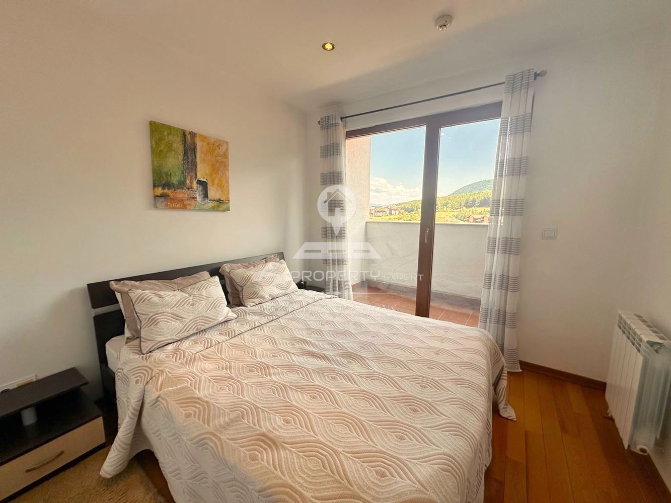 ПРОСТОРЕН ЧЕТИРИСТАЕН АПАРТАМЕНТ В ЖИЛИЩНА СГРАДА "PIRIN LODGE" ГР. БАНСКО - 0