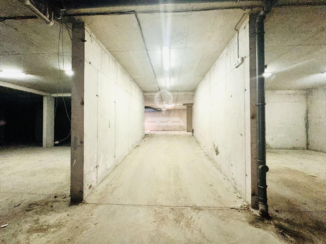 ПАРКОМЯСТО В ПОДЗЕМЕН ГАРАЖ В ЖИЛИЩНА СГРАДА "МАУНТАЙН ПАРАДАЙС", КВ. ГЛАЗНЕ, ГР. БАНСКО - 0