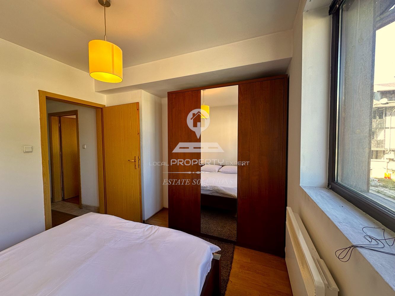 ПРОСТОРЕН ДВУСТАЕН АПАРТАМЕНТ В ЖИЛИЩНА СГРАДА "ВИХРЕН" ИДЕАЛЕН ЦЕНТЪР НА ГР.БАНСКО. - 0